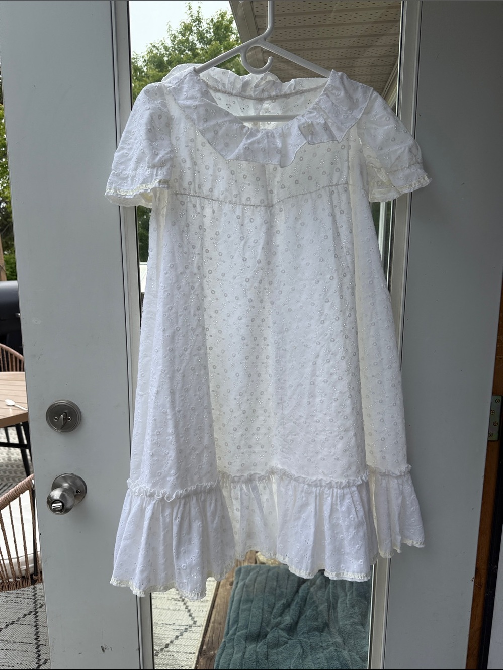 Pure white all-over eyelet cotton broderie anglaise rounded bib collar ruffles